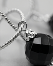 White gold omega earrings with onyx stone