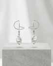 Silver omega earrings with an artificial brook pearl