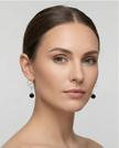 White gold omega earrings with onyx stone
