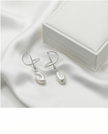 Silver omega earrings with an artificial brook pearl