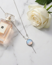 Silver and white opal necklace