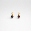 Regina 14 karat gold earrings with garnet charms