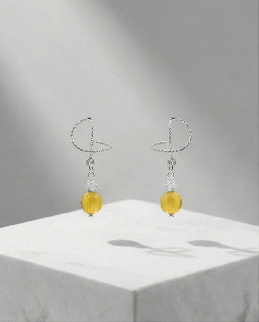 Silver omega earrings with an artificial brook pearl