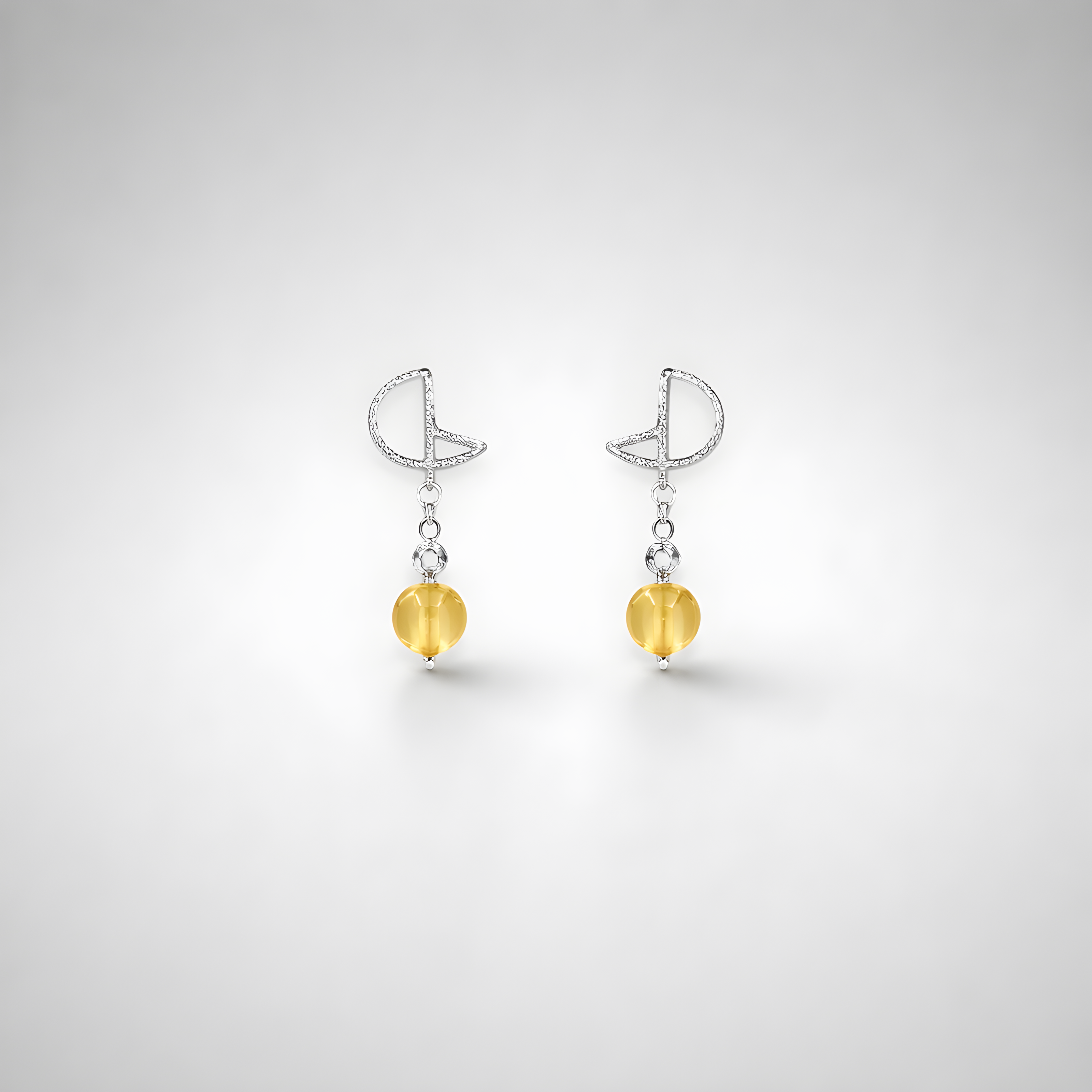 Silver omega earrings with an artificial brook pearl