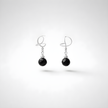 White gold omega earrings with onyx stone