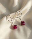 Omega silver earrings with a purple agate stone