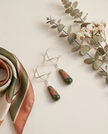 Silver earrings with a drop of Unikate