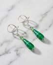 Silver earrings with a drop of green agate