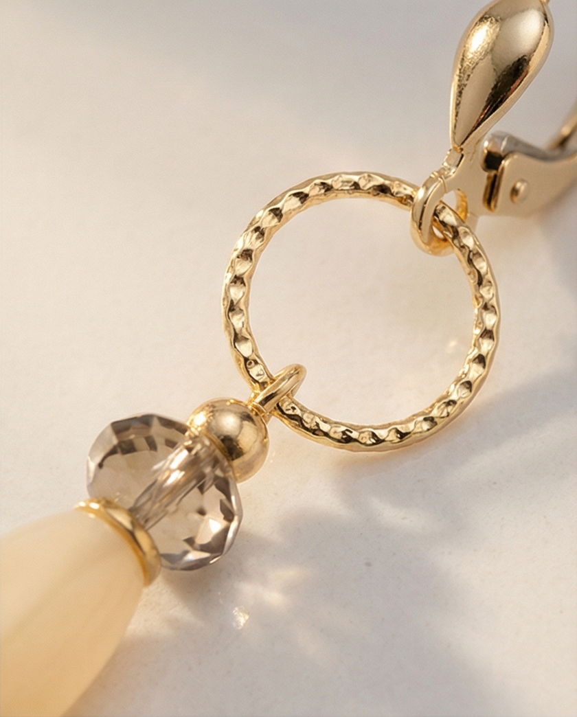 14 carat gold earrings with topaz and moonstone