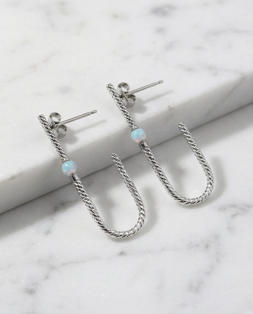 Earrings designed with opal