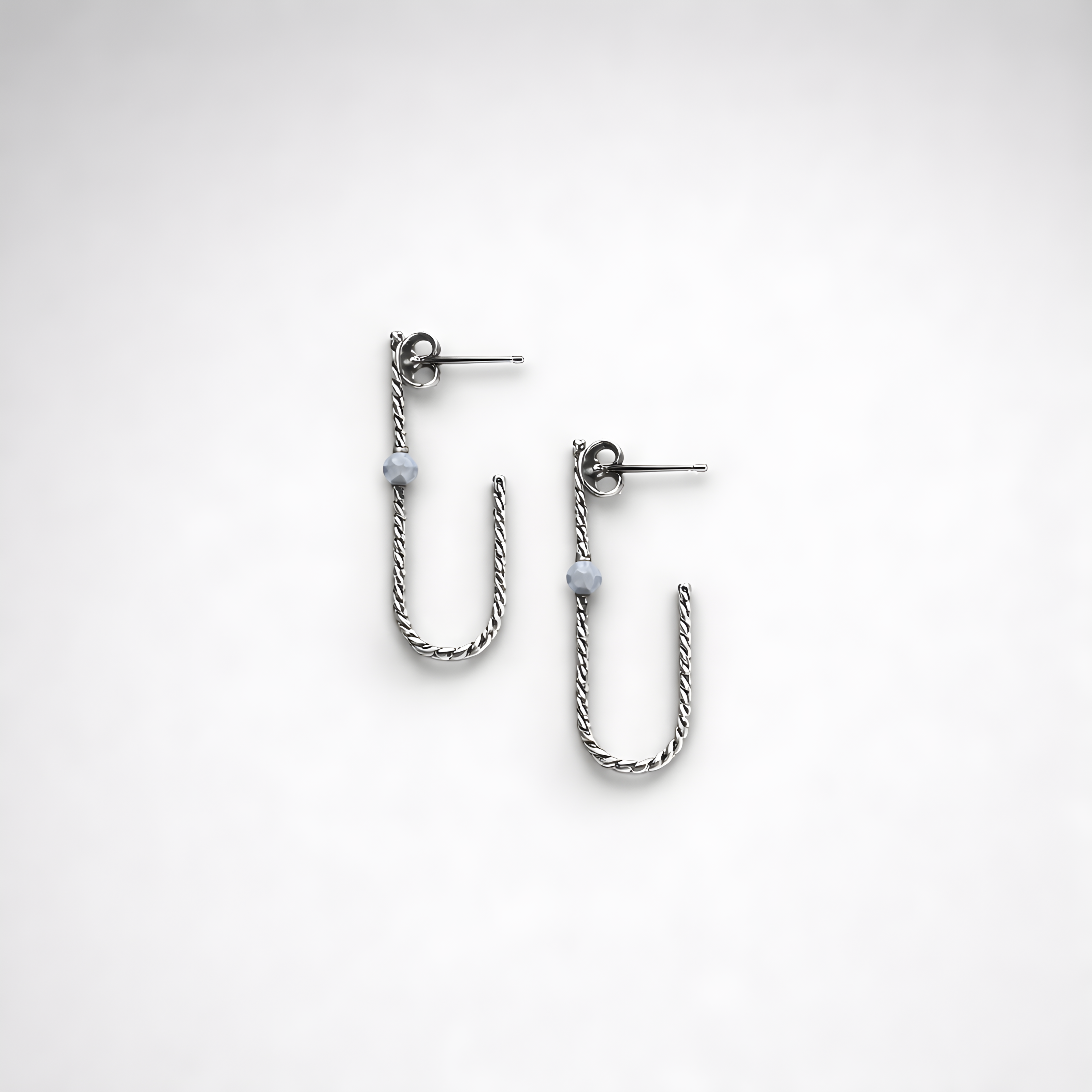 Earrings designed with opal
