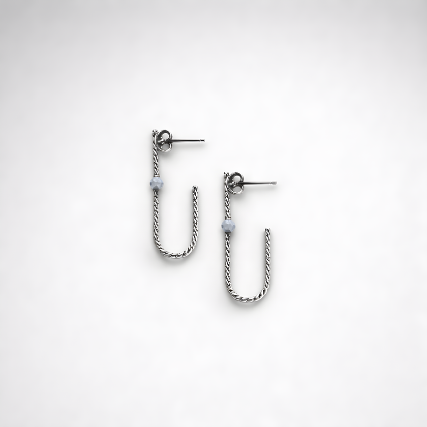 Earrings designed with opal