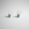 14 carat white gold earrings with a turquoise stone