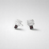 14 carat white gold earrings with garnet stones
