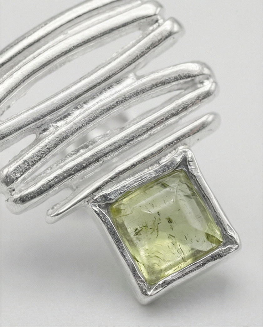 14 carat white gold earrings with chrysolite stones