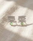 Silver earrings with parting stones