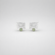 Silver earrings with parting stones