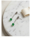 Earrings designed with green agate