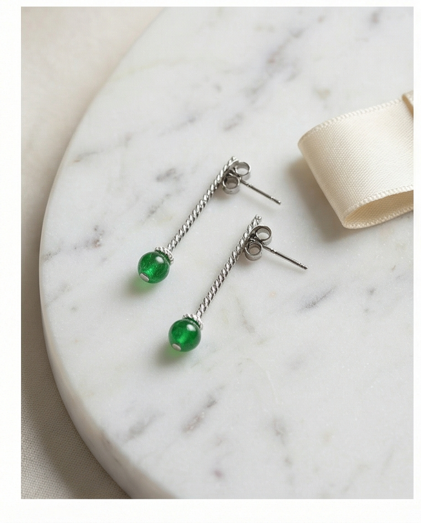 Earrings designed with green agate