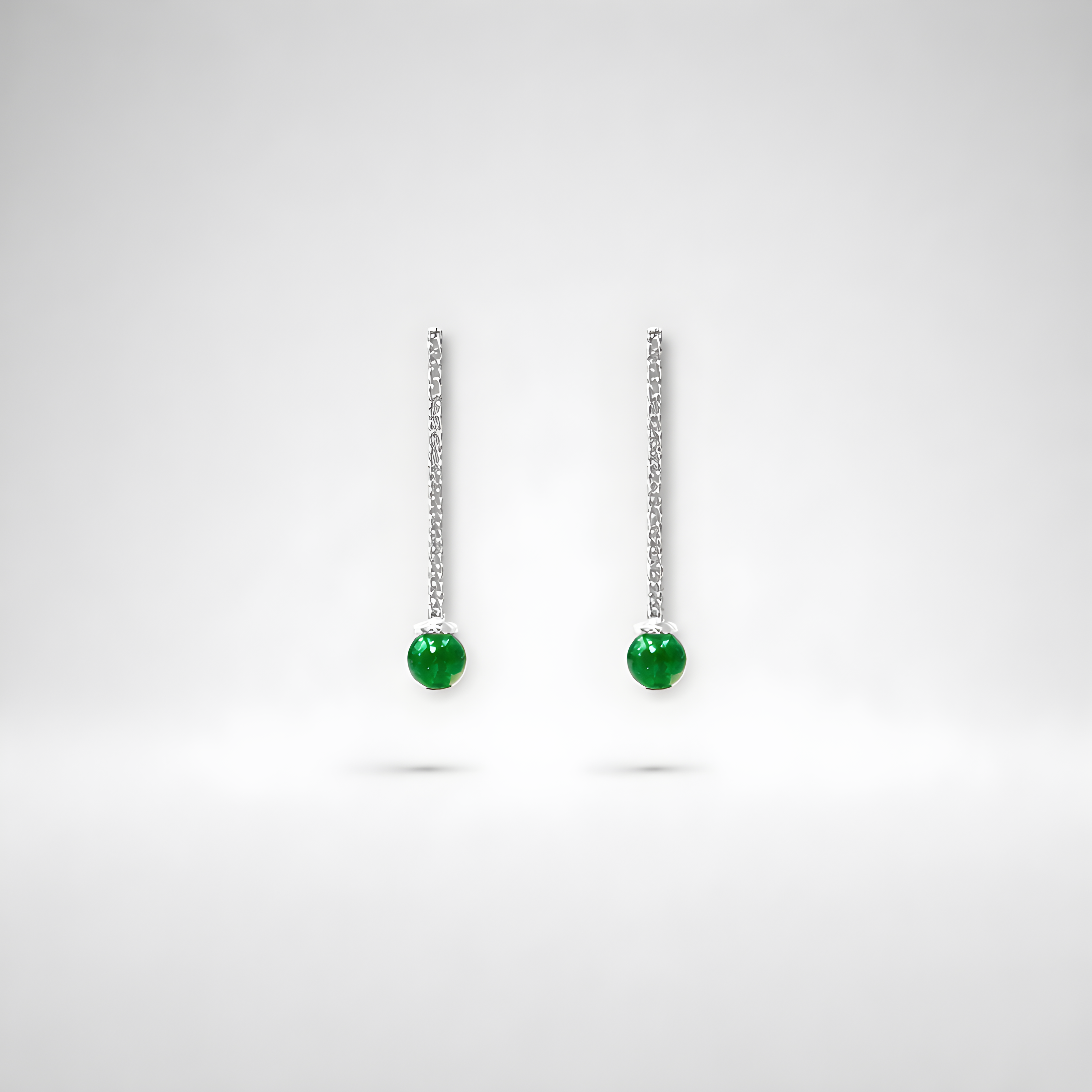 Earrings designed with green agate