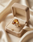 Silver ring with a crystal in the shade of citrine