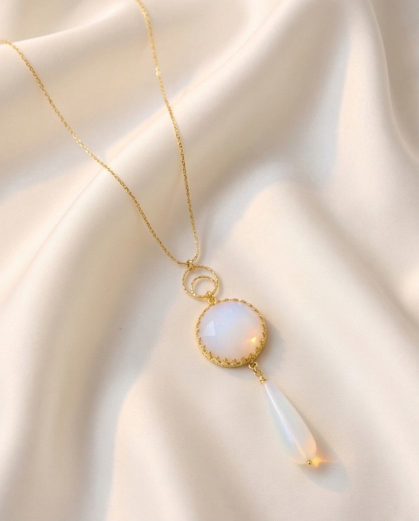 Silver necklace with pendant inlaid with white opalite