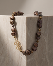 Double pearl necklace in chocolate-toned brocade