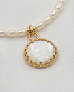 White pearl necklace with pendant
