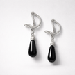Omega silver earrings with onyx drops