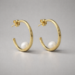 Gold-plated silver hoop earrings with a white pearl