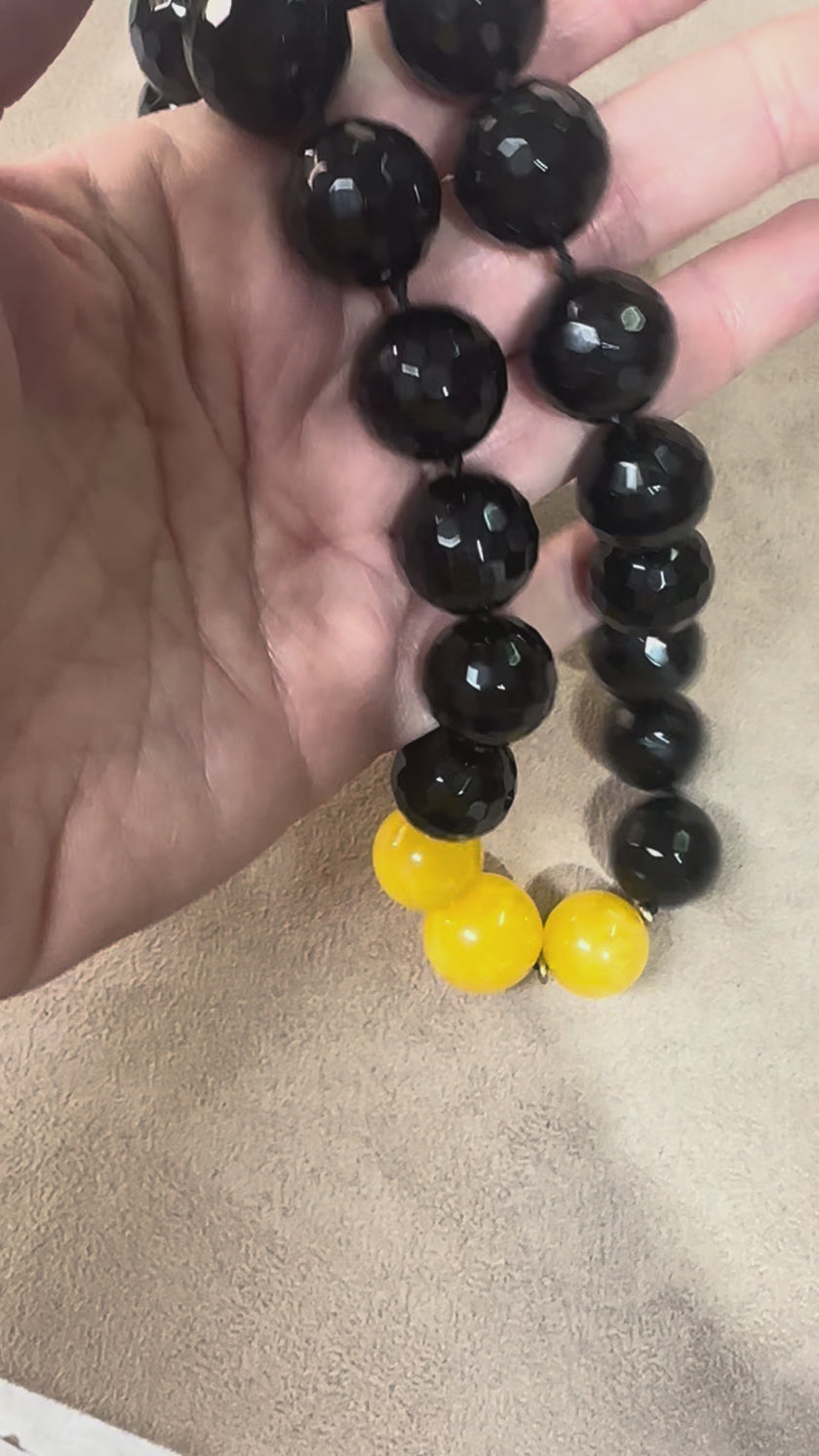 Onyx necklace with gold plated ornaments